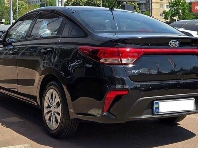 Чорний Кіа Ріо, об'ємом двигуна 1.37 л та пробігом 63 тис. км за 10000 $, фото 3 на Automoto.ua