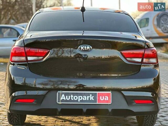 Чорний Кіа Ріо, об'ємом двигуна 1.6 л та пробігом 74 тис. км за 11790 $, фото 5 на Automoto.ua