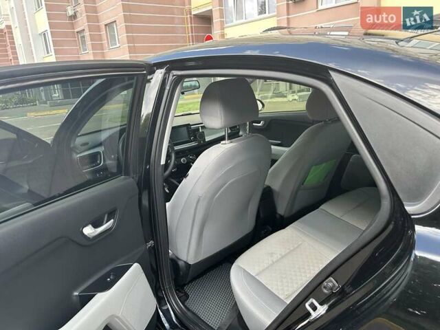 Чорний Кіа Ріо, об'ємом двигуна 1.59 л та пробігом 55 тис. км за 14150 $, фото 5 на Automoto.ua