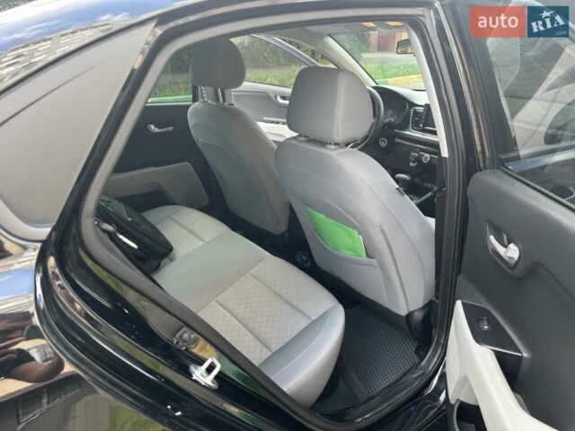 Чорний Кіа Ріо, об'ємом двигуна 1.59 л та пробігом 55 тис. км за 14150 $, фото 1 на Automoto.ua