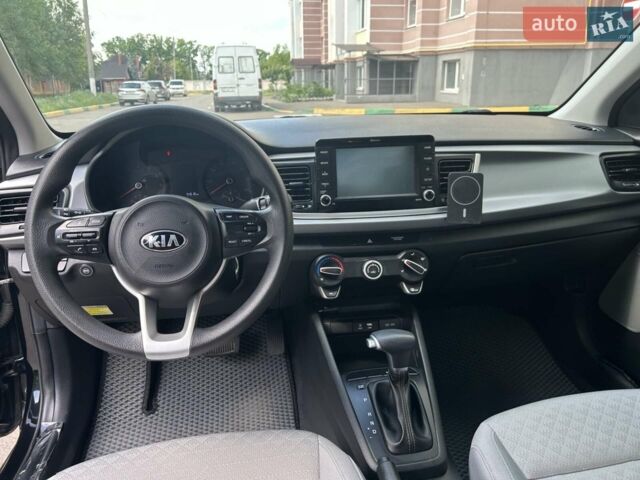 Чорний Кіа Ріо, об'ємом двигуна 1.59 л та пробігом 55 тис. км за 14150 $, фото 3 на Automoto.ua