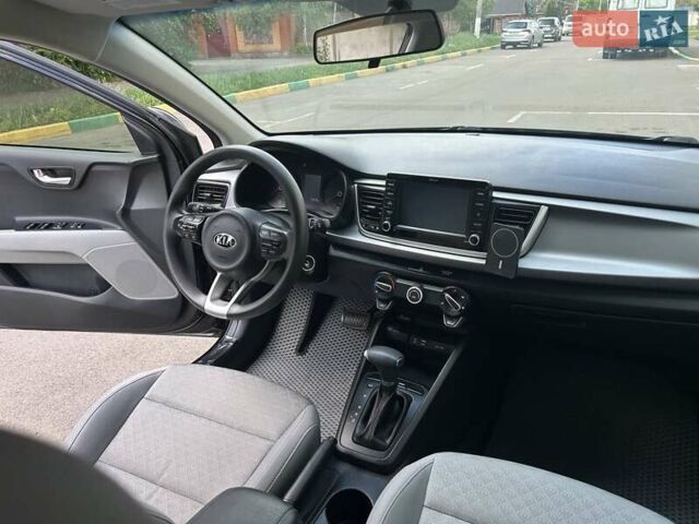 Чорний Кіа Ріо, об'ємом двигуна 1.59 л та пробігом 55 тис. км за 14150 $, фото 2 на Automoto.ua