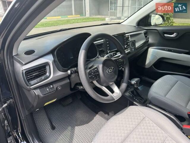 Чорний Кіа Ріо, об'ємом двигуна 1.59 л та пробігом 55 тис. км за 14150 $, фото 7 на Automoto.ua