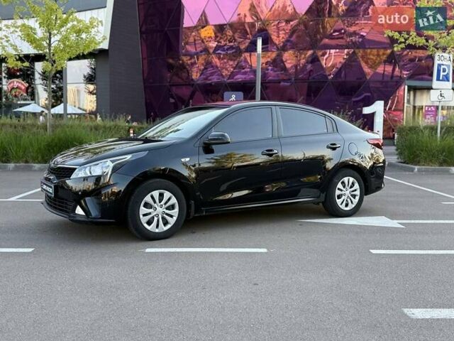 Чорний Кіа Ріо, об'ємом двигуна 1.37 л та пробігом 62 тис. км за 14390 $, фото 2 на Automoto.ua