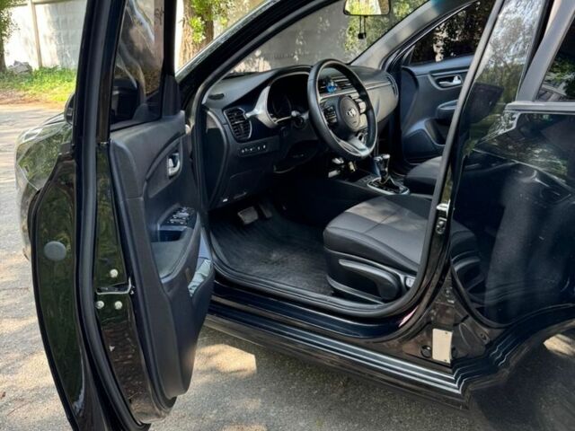 Черный Киа Рио, объемом двигателя 1.4 л и пробегом 24 тыс. км за 12800 $, фото 16 на Automoto.ua