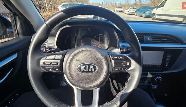 Черный Киа Рио, объемом двигателя 1.59 л и пробегом 59 тыс. км за 14999 $, фото 2 на Automoto.ua