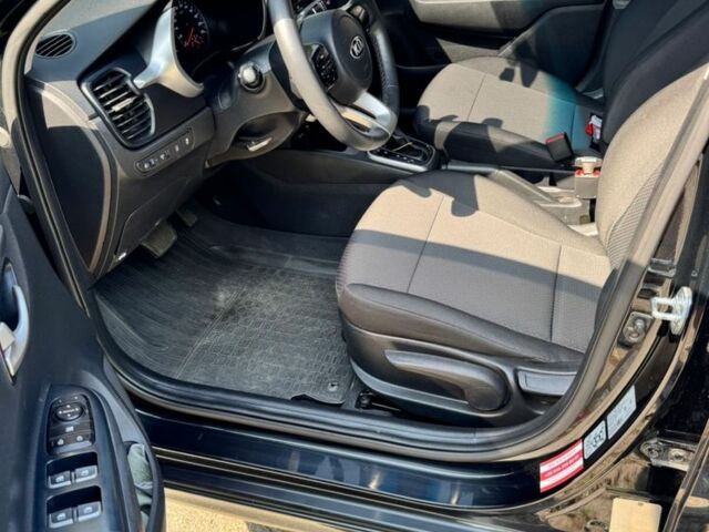 Черный Киа Рио, объемом двигателя 1.4 л и пробегом 24 тыс. км за 12800 $, фото 9 на Automoto.ua
