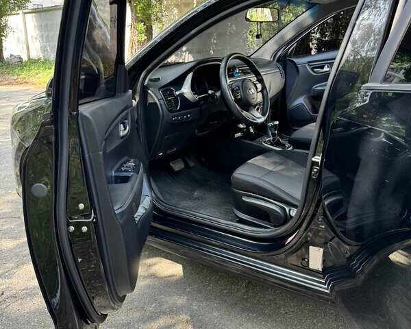 Черный Киа Рио, объемом двигателя 1.37 л и пробегом 25 тыс. км за 11999 $, фото 20 на Automoto.ua