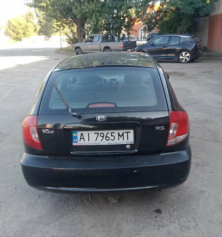 Черный Киа Рио, объемом двигателя 1.34 л и пробегом 230 тыс. км за 3400 $, фото 5 на Automoto.ua