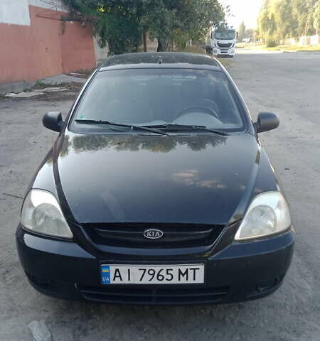 Черный Киа Рио, объемом двигателя 1.34 л и пробегом 230 тыс. км за 3400 $, фото 3 на Automoto.ua