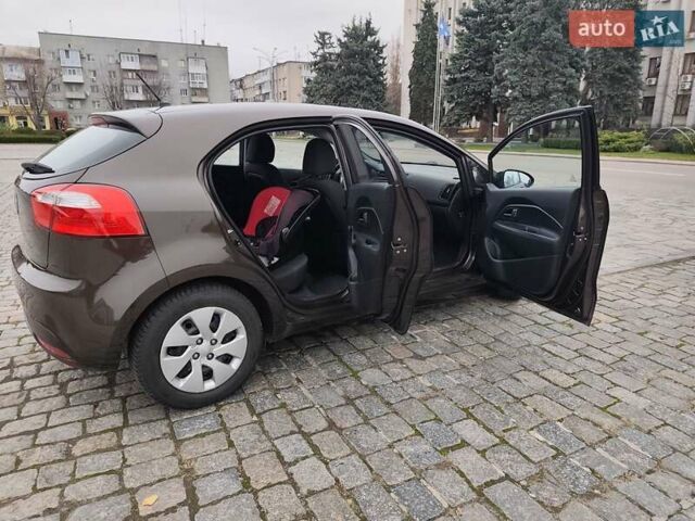 Коричневий Кіа Ріо, об'ємом двигуна 1.25 л та пробігом 238 тис. км за 6900 $, фото 10 на Automoto.ua