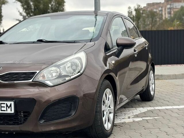 Коричневий Кіа Ріо, об'ємом двигуна 1.12 л та пробігом 298 тис. км за 4900 $, фото 1 на Automoto.ua