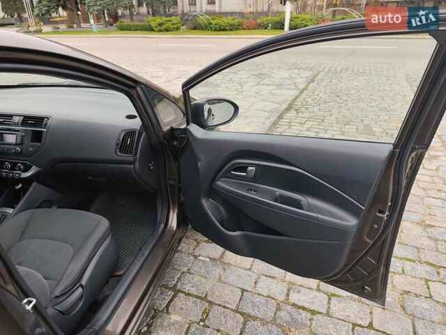 Коричневий Кіа Ріо, об'ємом двигуна 1.25 л та пробігом 238 тис. км за 6900 $, фото 12 на Automoto.ua