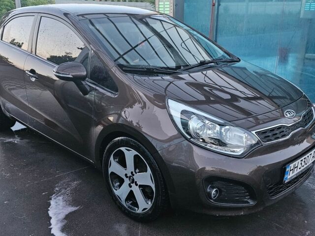 Коричневий Кіа Ріо, об'ємом двигуна 1.4 л та пробігом 230 тис. км за 7000 $, фото 9 на Automoto.ua
