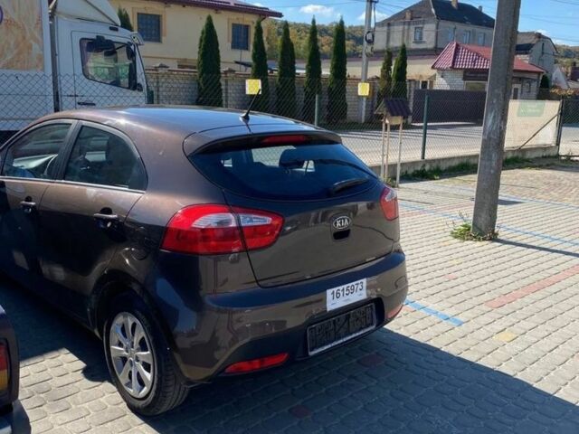 Коричневий Кіа Ріо, об'ємом двигуна 1.1 л та пробігом 234 тис. км за 5500 $, фото 1 на Automoto.ua