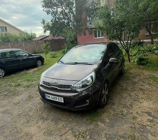 Коричневий Кіа Ріо, об'ємом двигуна 1.4 л та пробігом 180 тис. км за 9100 $, фото 2 на Automoto.ua