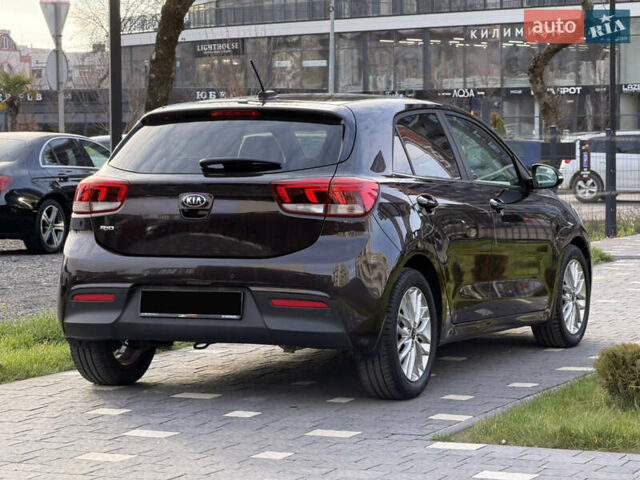 Коричневий Кіа Ріо, об'ємом двигуна 1.4 л та пробігом 82 тис. км за 14800 $, фото 17 на Automoto.ua