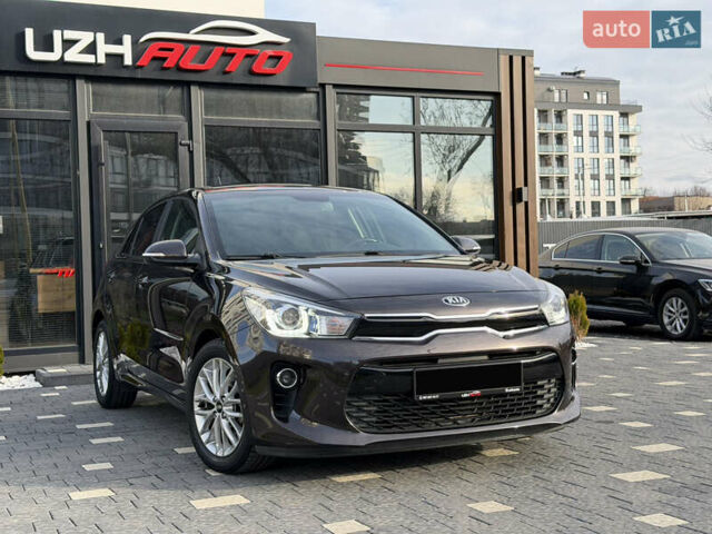 Коричневий Кіа Ріо, об'ємом двигуна 1.4 л та пробігом 82 тис. км за 14800 $, фото 7 на Automoto.ua