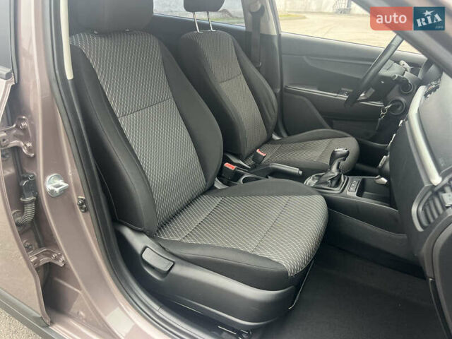 Коричневый Киа Рио, объемом двигателя 1.59 л и пробегом 65 тыс. км за 12800 $, фото 14 на Automoto.ua