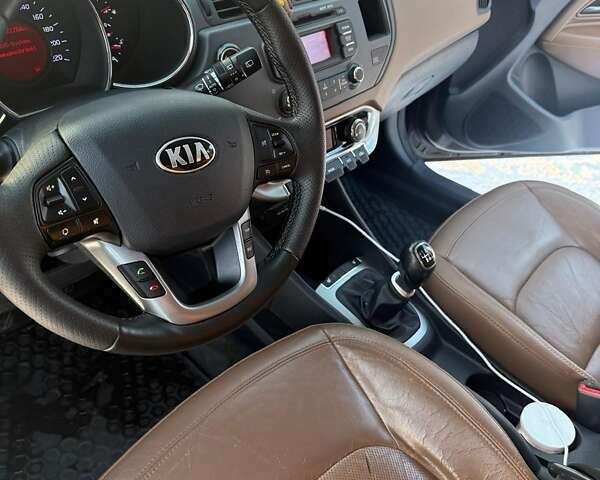 Коричневий Кіа Ріо, об'ємом двигуна 1.4 л та пробігом 171 тис. км за 7950 $, фото 17 на Automoto.ua