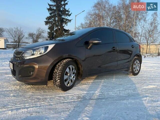 Коричневий Кіа Ріо, об'ємом двигуна 1.4 л та пробігом 171 тис. км за 7950 $, фото 43 на Automoto.ua