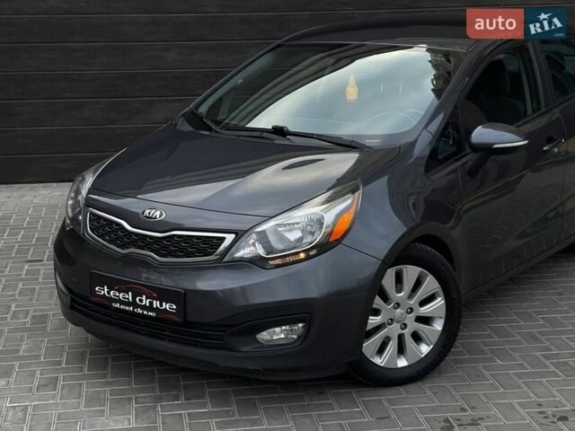 Коричневий Кіа Ріо, об'ємом двигуна 1.59 л та пробігом 129 тис. км за 9699 $, фото 1 на Automoto.ua