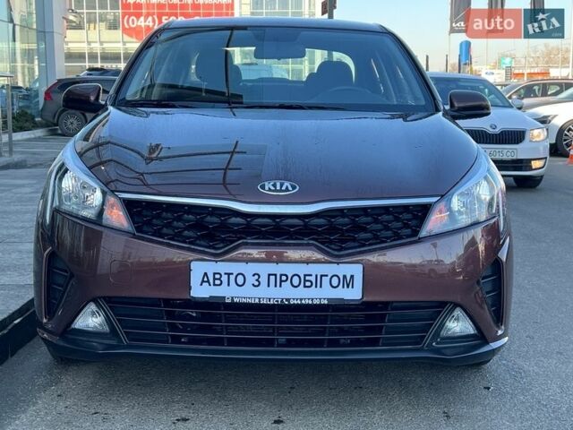 Коричневий Кіа Ріо, об'ємом двигуна 1.59 л та пробігом 59 тис. км за 11469 $, фото 1 на Automoto.ua