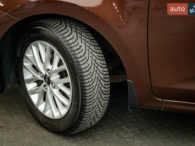 Коричневий Кіа Ріо, об'ємом двигуна 1.6 л та пробігом 39 тис. км за 15768 $, фото 7 на Automoto.ua