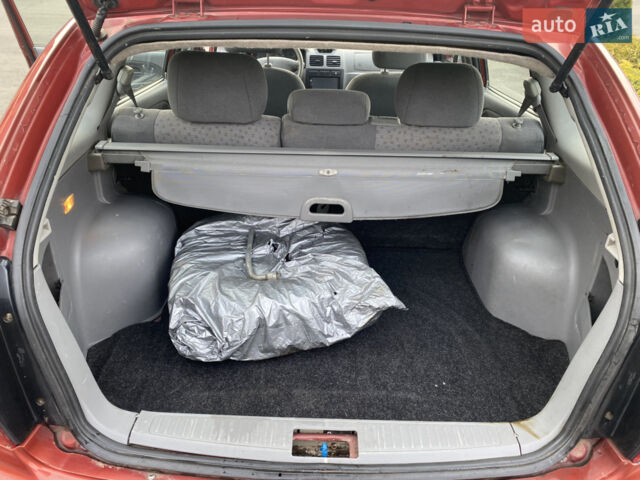 Красный Киа Рио, объемом двигателя 1.44 л и пробегом 220 тыс. км за 2650 $, фото 5 на Automoto.ua