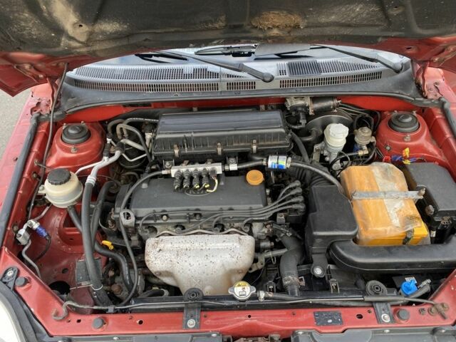 Красный Киа Рио, объемом двигателя 1.4 л и пробегом 270 тыс. км за 3000 $, фото 7 на Automoto.ua