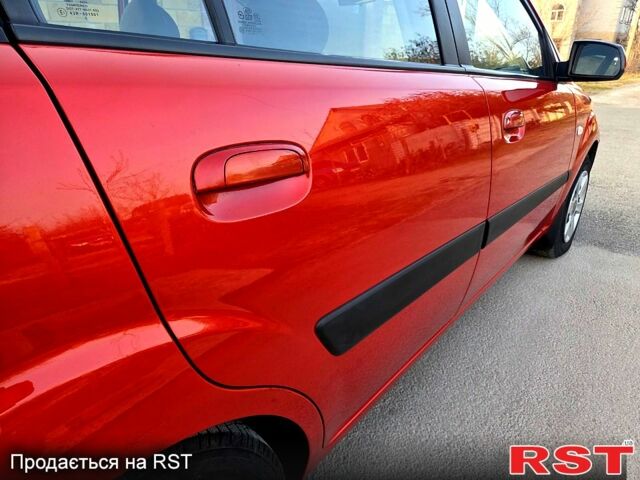 Червоний Кіа Ріо, об'ємом двигуна 1.4 л та пробігом 162 тис. км за 4999 $, фото 6 на Automoto.ua