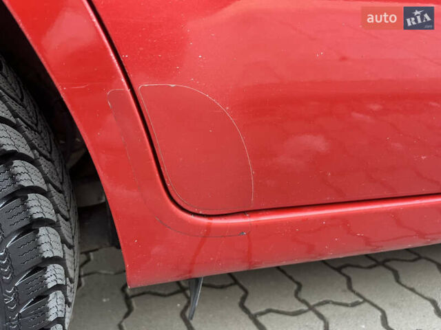 Червоний Кіа Ріо, об'ємом двигуна 1.4 л та пробігом 292 тис. км за 3999 $, фото 14 на Automoto.ua