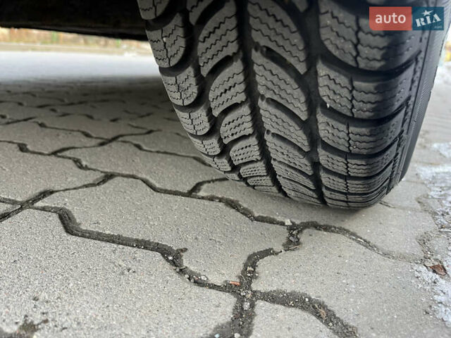 Червоний Кіа Ріо, об'ємом двигуна 1.4 л та пробігом 292 тис. км за 3999 $, фото 13 на Automoto.ua