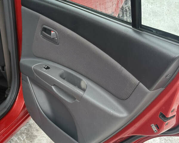 Красный Киа Рио, объемом двигателя 1.4 л и пробегом 110 тыс. км за 5900 $, фото 16 на Automoto.ua