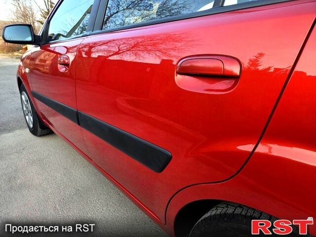 Червоний Кіа Ріо, об'ємом двигуна 1.4 л та пробігом 162 тис. км за 4999 $, фото 8 на Automoto.ua