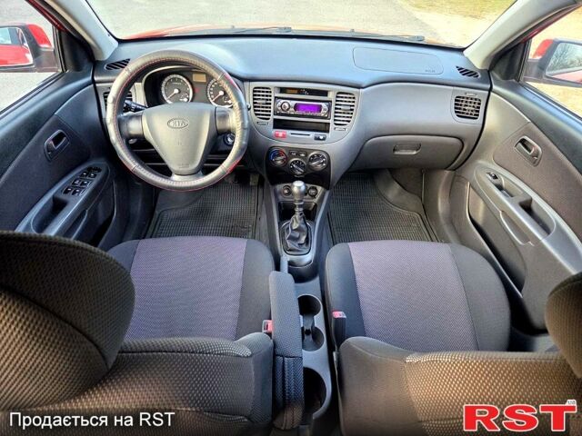 Червоний Кіа Ріо, об'ємом двигуна 1.4 л та пробігом 162 тис. км за 4999 $, фото 11 на Automoto.ua