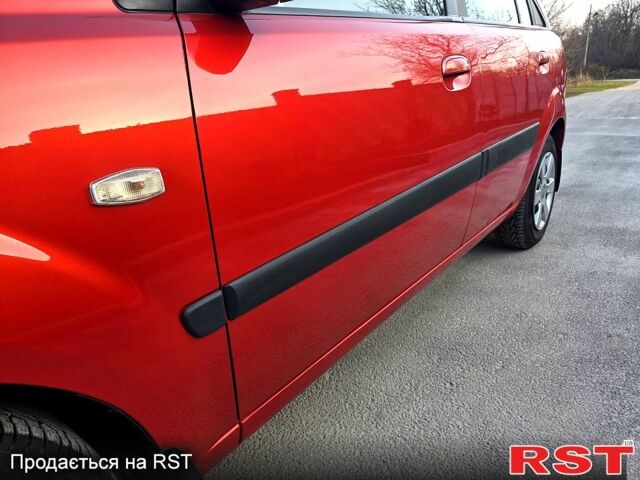 Червоний Кіа Ріо, об'ємом двигуна 1.4 л та пробігом 162 тис. км за 4999 $, фото 1 на Automoto.ua