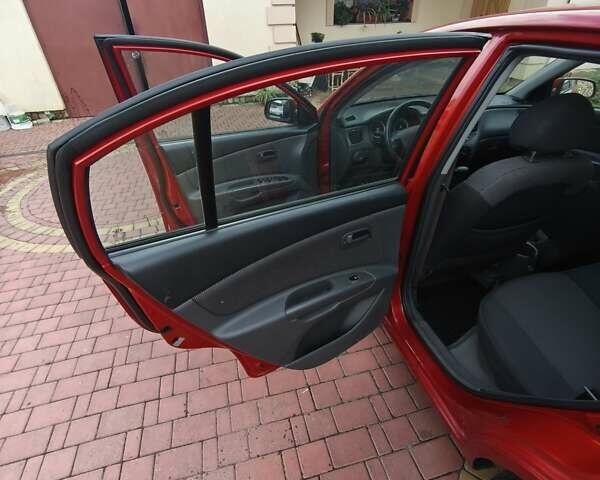Червоний Кіа Ріо, об'ємом двигуна 1.4 л та пробігом 106 тис. км за 4800 $, фото 10 на Automoto.ua