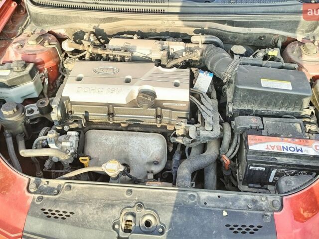 Красный Киа Рио, объемом двигателя 1.4 л и пробегом 202 тыс. км за 5400 $, фото 4 на Automoto.ua