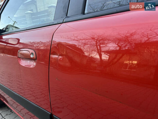 Червоний Кіа Ріо, об'ємом двигуна 1.4 л та пробігом 292 тис. км за 3999 $, фото 11 на Automoto.ua