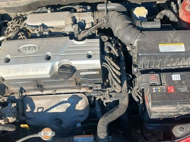 Красный Киа Рио, объемом двигателя 1.4 л и пробегом 219 тыс. км за 4100 $, фото 2 на Automoto.ua