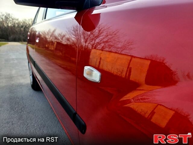 Червоний Кіа Ріо, об'ємом двигуна 1.4 л та пробігом 162 тис. км за 4999 $, фото 3 на Automoto.ua