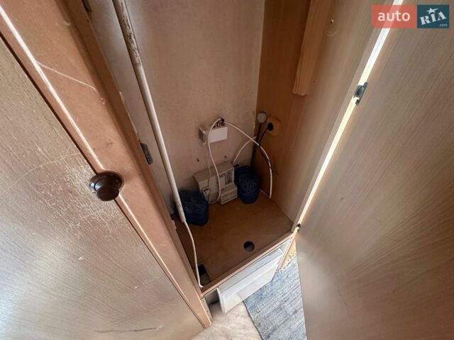 Червоний Кіа Ріо, об'ємом двигуна 1.4 л та пробігом 160 тис. км за 5000 $, фото 11 на Automoto.ua