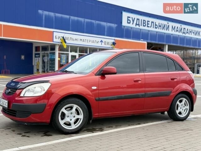 Красный Киа Рио, объемом двигателя 1.4 л и пробегом 153 тыс. км за 6499 $, фото 1 на Automoto.ua