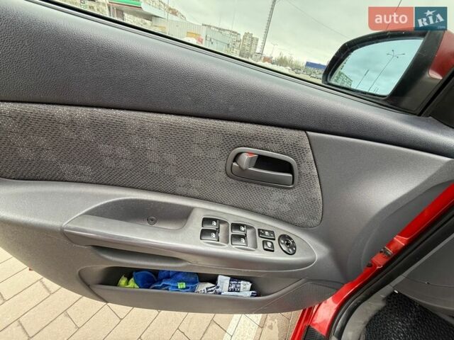 Червоний Кіа Ріо, об'ємом двигуна 1.4 л та пробігом 153 тис. км за 6399 $, фото 17 на Automoto.ua