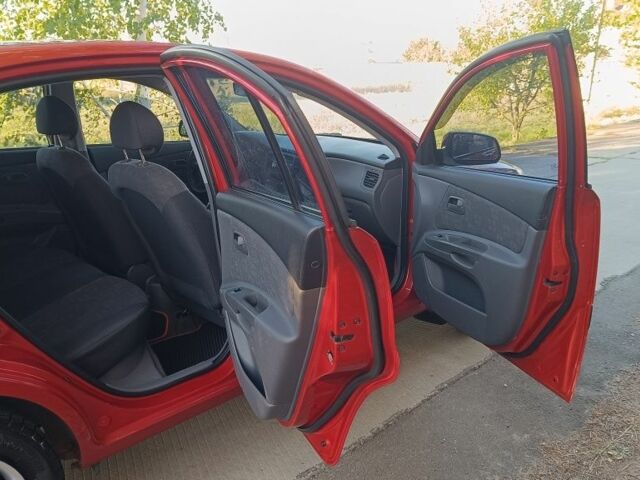 Красный Киа Рио, объемом двигателя 1.4 л и пробегом 161 тыс. км за 5774 $, фото 11 на Automoto.ua