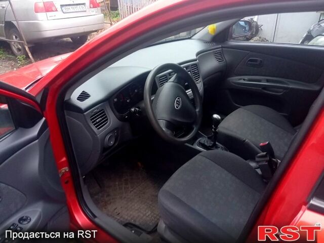 Красный Киа Рио, объемом двигателя 1.4 л и пробегом 170 тыс. км за 4499 $, фото 2 на Automoto.ua