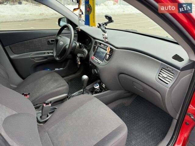 Червоний Кіа Ріо, об'ємом двигуна 1.4 л та пробігом 153 тис. км за 6399 $, фото 22 на Automoto.ua