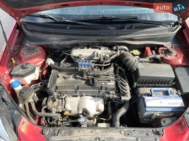 Красный Киа Рио, объемом двигателя 1.4 л и пробегом 216 тыс. км за 3900 $, фото 25 на Automoto.ua