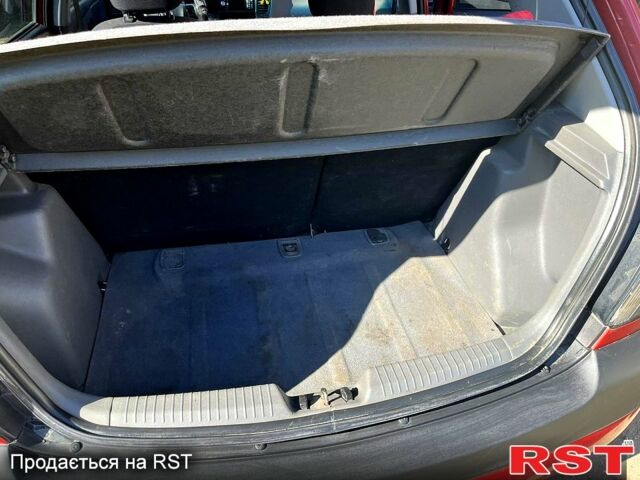 Красный Киа Рио, объемом двигателя 1.4 л и пробегом 214 тыс. км за 6500 $, фото 5 на Automoto.ua
